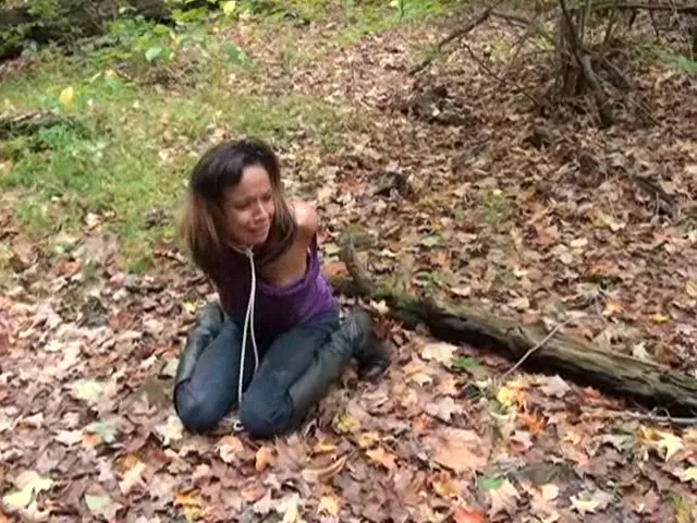 Purple shirt hottie running through the woods trying to escape