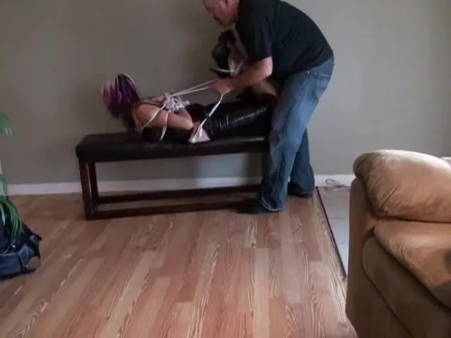 Naughty babe with dyed hair gets hogtied on camera