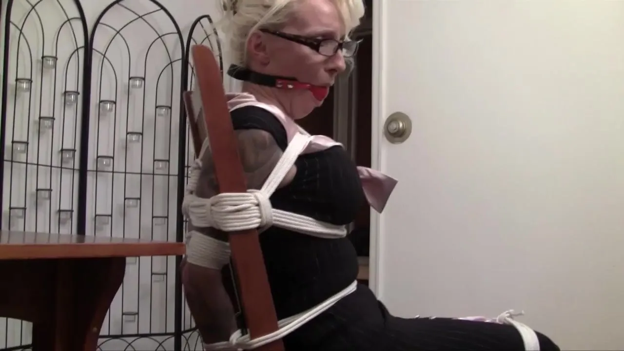 Tattooed blonde secretary feels ropes all over her body