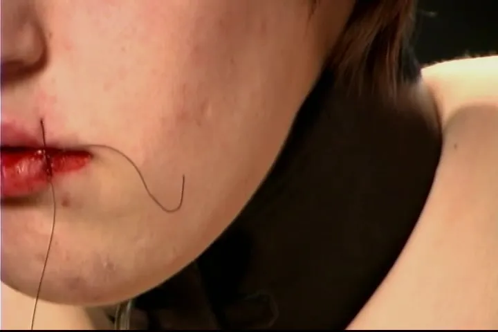 Crazy master is stitching her mouth during BDSM session