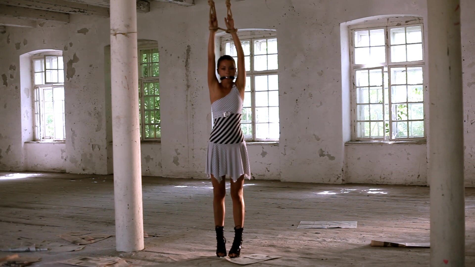 Skinny Fashion and BDSM model LEA TYRON tied up in suspension and bullwhipped