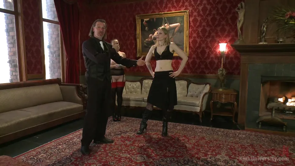 Mistress teaching her maid manners in a mansion