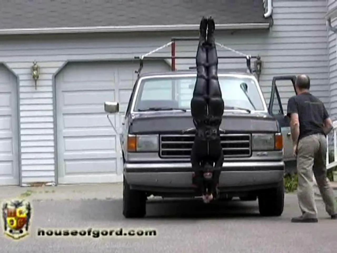 This maniac tied up a slut to his truck's front and moves her everywhere