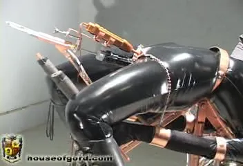 Simultaneous mouth and pussy deepthroat in shiny latex