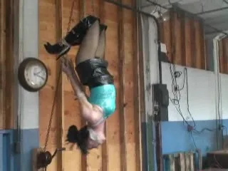 Leather boots beauty hanging upside down and getting gased